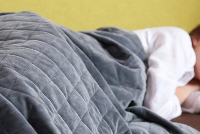 Are You Overheating Under That Pile of Weighted Blankets?